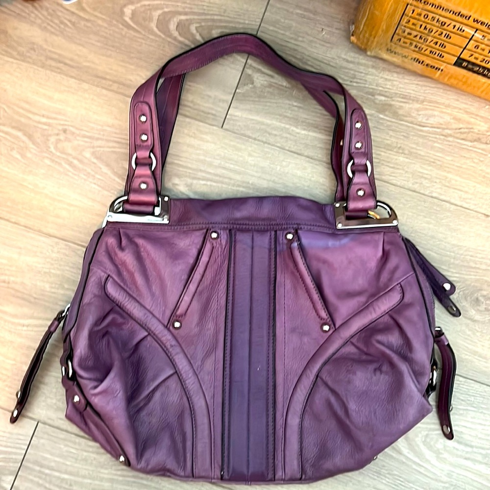 This purse is in amazing condition. Real leather.